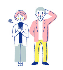 困った表情の中年カップル　全身