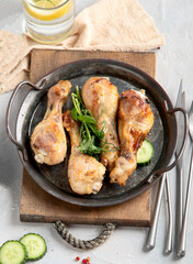 Baked chicken legs with salad and potatoes