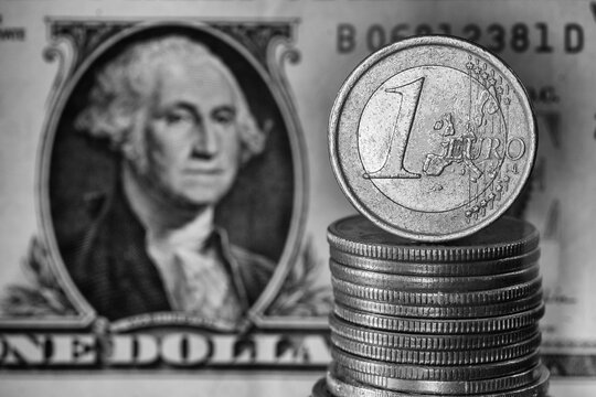 Euro and Dollar Exchange Rate Coin And Bill Relationship Black and White Macro
