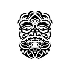 Tribal mask. Monochrome ethnic patterns. Black tattoo in the style of the ancient tribes. Isolated. Hand drawn vector illustration.