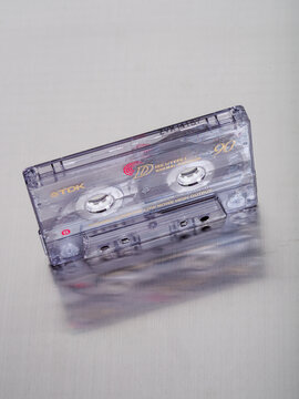 vintage tdk cassette tape isolated on metal alluminium background - no people