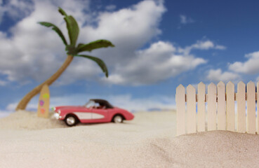 Fence on Tropical Beach with Vintage Hot Rod in Background