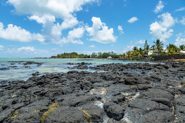 Rocky beach at Grand Gaube in the north of the republic of Mauritius.