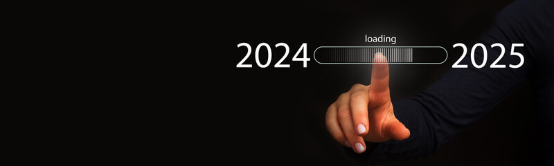 Finger pointing to loading to complete the year