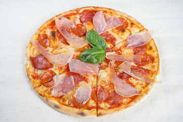 pizza with jamon cheese tomatoes 