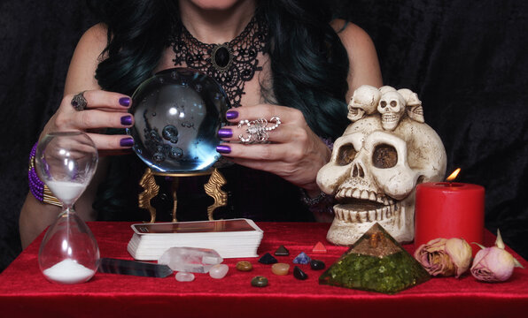 Psychic with crystal ball and tarot cards, Shallow DOF