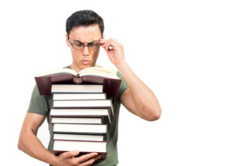 Smart man adjusting glasses and reading book