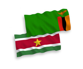 Flags of Republic of Zambia and Republic of Suriname on a white background