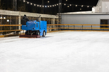 Fototapeta premium machine levels the ice after skating