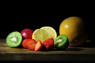 Juicy fruits on the wooden table