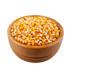 Dry corn seeds in wooden bowl,top view
