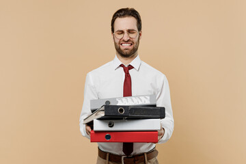 Young displeased employee business man corporate lawyer 20s in classic formal white shirt red tie...