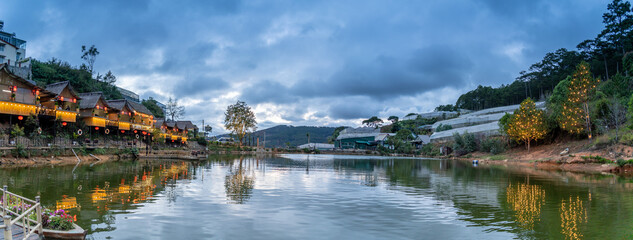 Fototapeta premium An Son Ho lake in sunset, Da Lat, Viet Nam. Beautiful landscape with clouds and misty. Panorama