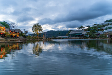 Naklejka premium An Son Ho lake in sunset, Da Lat, Viet Nam. Beautiful landscape with clouds and misty. Panorama