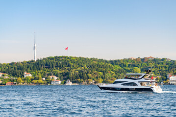 Speedboat is crossing the Bosporus in Istanbul, Turkey