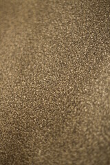 Close-up of sand background texture. Gold color texture.