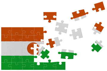 Broken puzzle- game background in colors of national flag. Niger