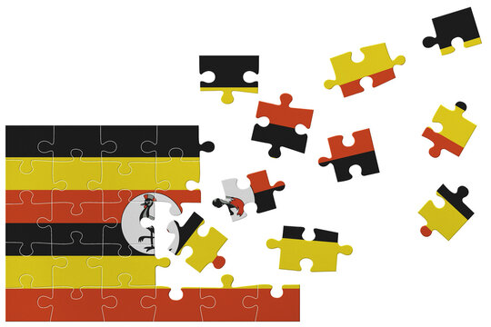 Broken puzzle- game background in colors of national flag. Uganda