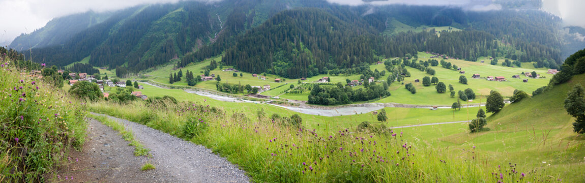 hiking route from Klosters to Monbiel, view to the valley and Landquart river, swiss alps