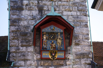 Close-up of tone clock tower with figures and ornaments at the old town of Solothurn on sunny winter day. Photo taken February 7th, 2022, Solothurn, Switzerland.