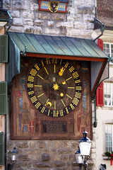 Close-up of clock face of clock tower at the medieval old town of Solothurn on a sunny winter day. Photo taken February 7th, 2022, Solothurn, Switzerland.