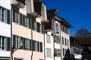 Beautiful historic houses at the old town of Solothurn on sunny winter day. Photo taken February 7th, 2022, Solothurn, Switzerland.