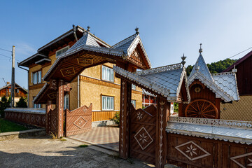 Fototapeta na wymiar Old houses in a Village of Moldovita in the Bucovina in Romania