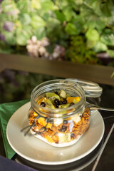 Muesli with fruit served in a jar
