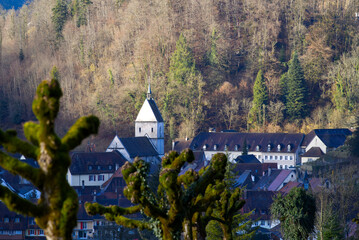 Aerial view of small medieval town St-Ursanne with river Doubs on a cloudy winter day. Photo taken...