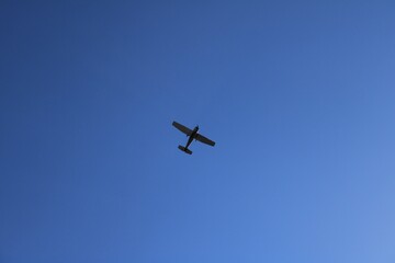 plane in the blue sky
