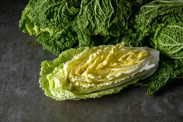 Napa cabbage or Chinese cabbage Fresh ripe chinese cabbage on a stone table, top view