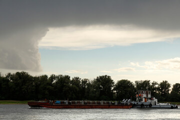 cargo ship on the water, a storm will come