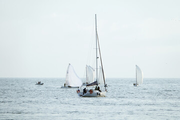 Obraz premium Sailing boats at sea. Sailboat management.