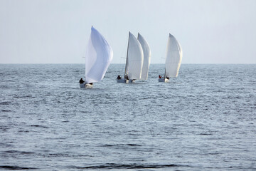 Obraz premium Sailing boats at sea. Sailboat management.