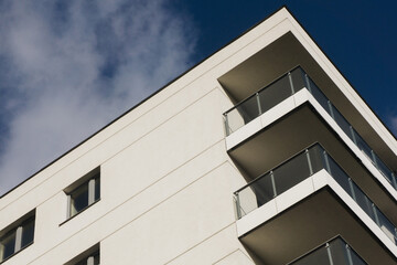 Luxurious apartments for sale. Bialystok city in Poland architecture background. High block of flats living area. New build neighborhood modern style. Real estate market in Europe.