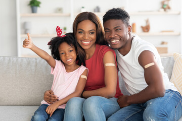 Vaccination Concept. Black Vaccinated Family Of Three With Adhesive Bandage On Arms