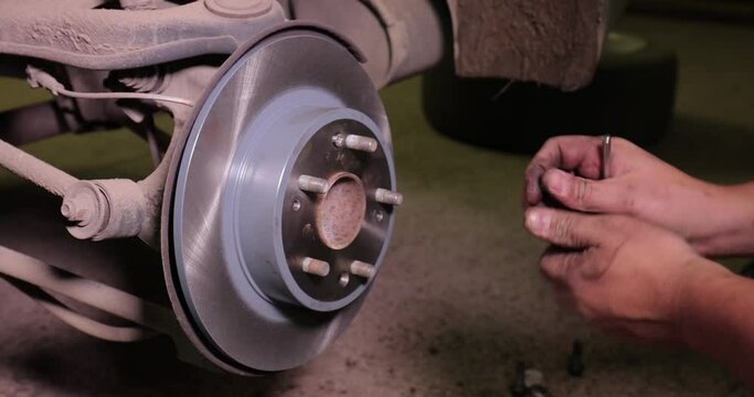 Changing brake rotor disc on a car