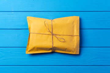 Lot of yellow paper postal envelopes. Top view.