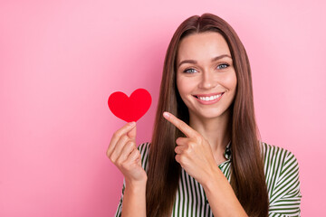 Photo of lovely millennial brunette lady index heart wear striped shirt isolated on pink color background