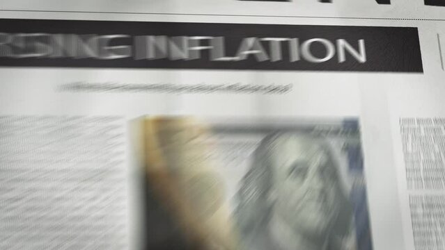 Rising inflation written newspaper animation with a burning 100 dollar bill photo on it which is also taken by me.