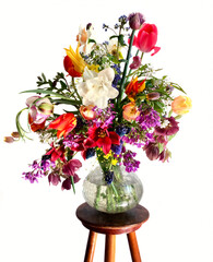 Bouquet of colorful garden flowers isolated on white background