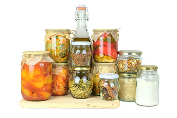 Assorted glass jars of homemade pickled or fermented vegetables and balanced dieting food isolated on white background. Fermented food concept.