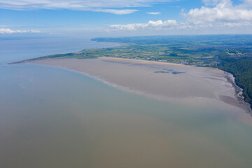 Fototapeta na wymiar Sand Bay Beach, Weston super mare tide out from drone