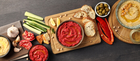 Concept of tasty food with hummus, top view