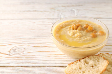 Concept of tasty food with hummus, space for text