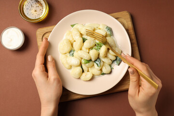 Concept of tasty food with potato gnocchi, top view