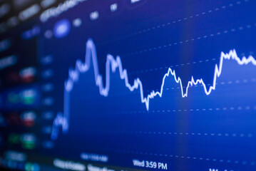 Grow Stock market trading graph in graphic concept.financial investment or economic trends business design. Abstract finance background.Low angle shot.