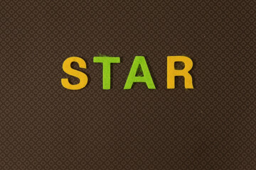 START word written on the wood block with chart, glasses and pencils. High quality photo