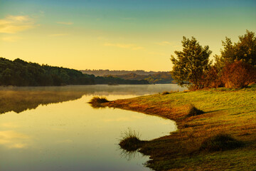 Morning fog over lake in Portugal