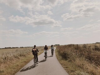 friends riding bikes